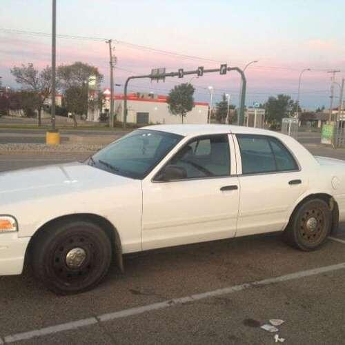 White Crown Vic Car