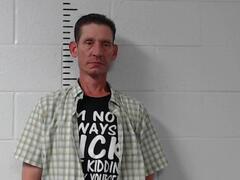 Mugshot of Moore, Curtis E